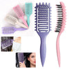 A collection of purple and pink professional curl define styling brushes shown in various angles.