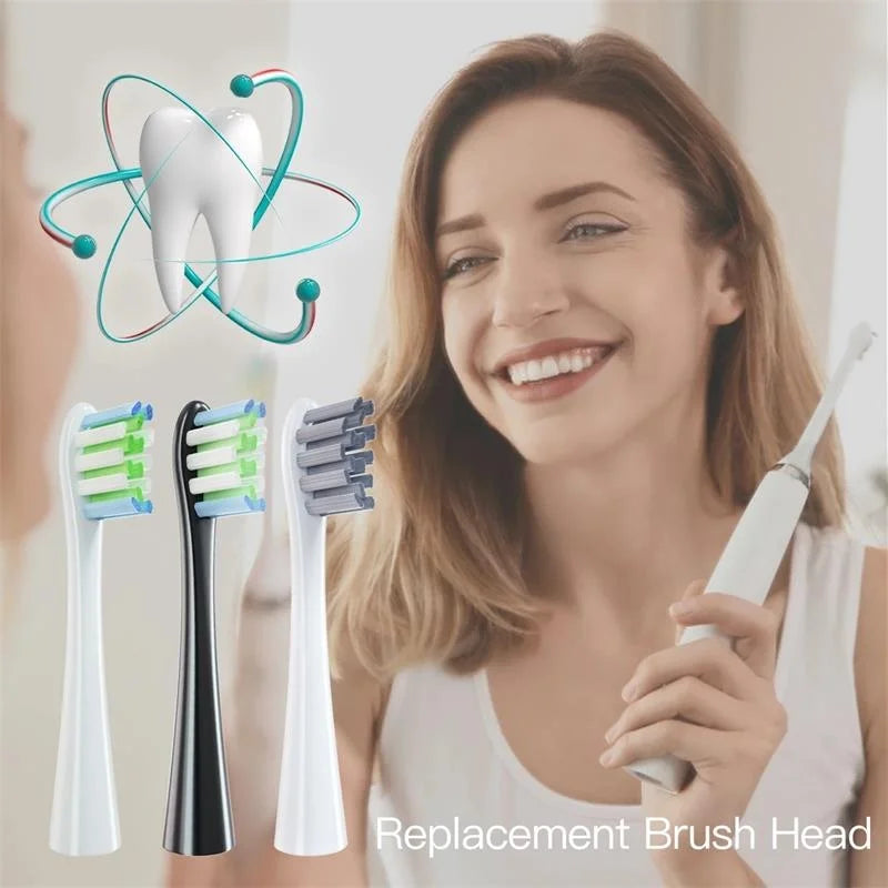 A woman smiles while holding a white replacement brush head for a sonic toothbrush.