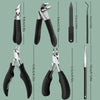 A set of professional stainless steel nail clippers in black and silver, shown from various angles.
