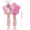 Set de peigne pour cheveux unicorn rose avec design et accents de perles colorées.