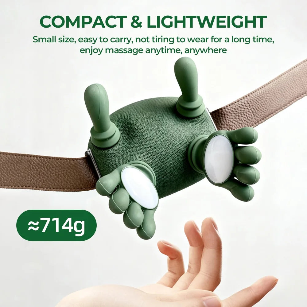 A hand is holding a compact, olive green wireless neck and shoulder massager with a beige strap.