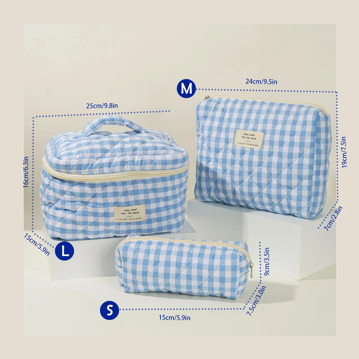 Three quilted cotton makeup bags in blue and white checkered patterns labeled M, L, and S.