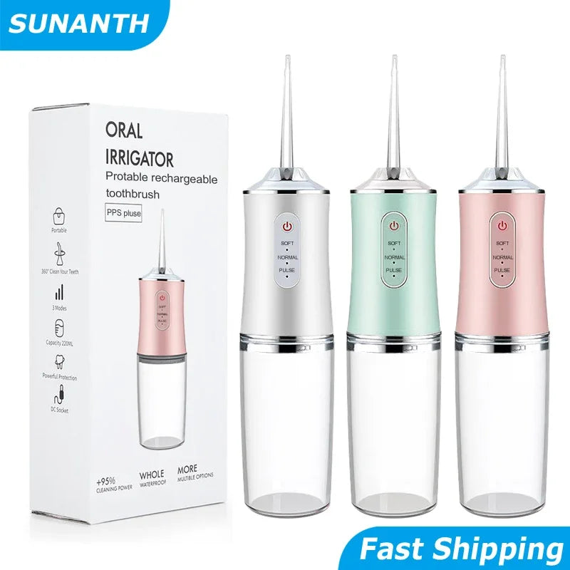 Appareil d'irrigateur buccal portable rechargeable de couleur rose et vert, avec son emballage.
