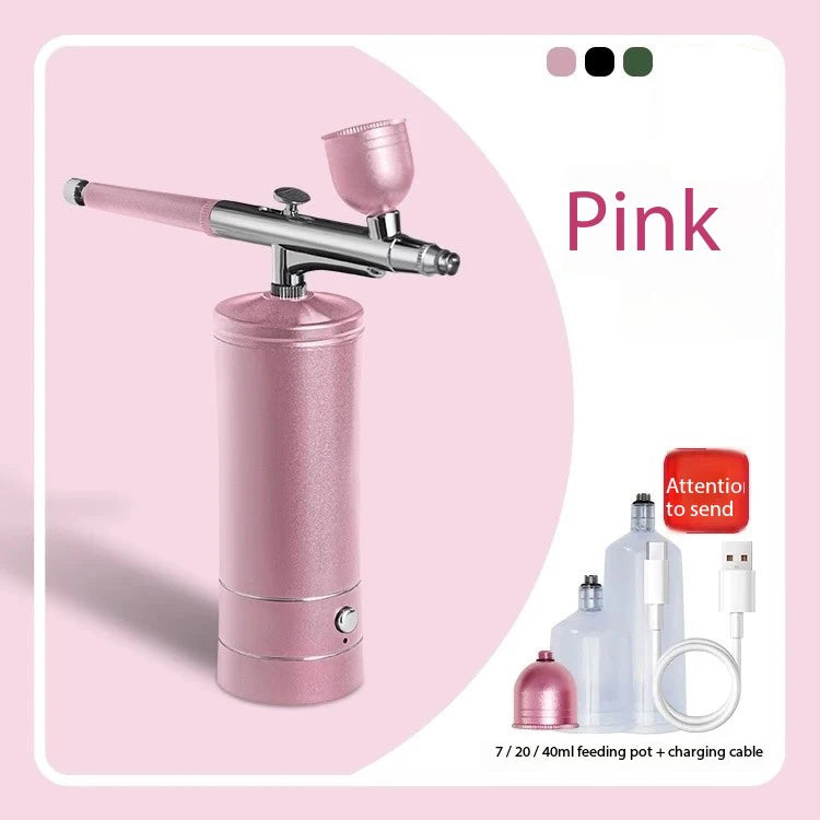 Pink portable airbrush set with a cylindrical bottle and charging cable for art and craft