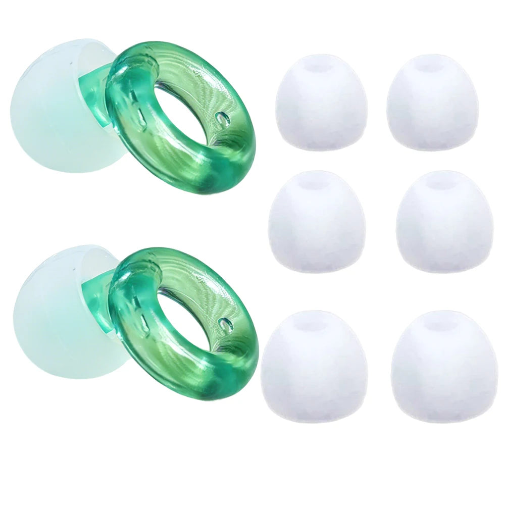 A set of silicone noise-cancelling earplugs in green and white, shown as rings and round plugs.