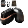 A black mini cordless hair straightener and styler with a gold accent, shown next to its charging cable and packaging.