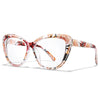 Clear cateye reading glasses with a marbled pink and brown pattern on the frame