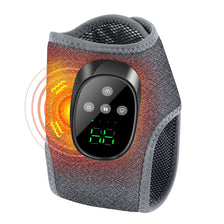 A black heated ankle massager with a textured gray and orange silicone cover and a digital display showing 88 degrees.