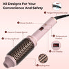 A pink ceramic curling iron with a round brush and various controls for styling hair.