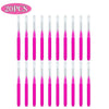 A set of 20 mini brow and eyelash combs in bright pink.