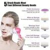 A close-up of a woman using various brush heads for facial cleansing and massage.