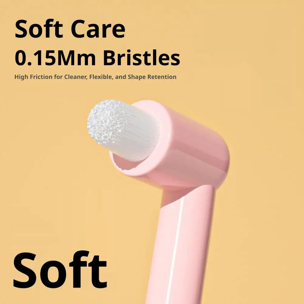 Primer plano de un cepillo de cuidado suave rosa con cerdas de 0.15 mm