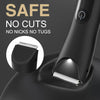 Close-up of a black precision electric body and hair trimmer with a safety switch visible.