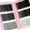 A pink plastic kit containing various lash extensions and tools for DIY use.