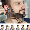 A man is shown using a beard styling stencil comb on his face to shape his beard.