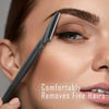 A close-up of a hand using a grooming tool to trim fine hairs on an eyebrow.