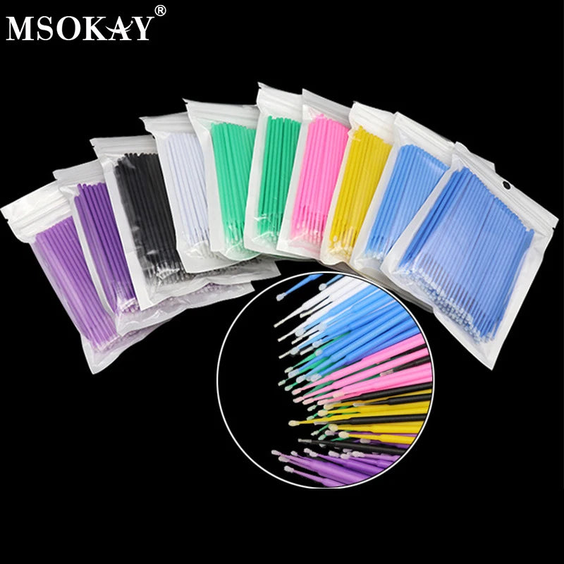 Collection de 100 pinceaux pour nettoyer et étendre les cils, dans diverses couleurs comme le rose, le vert, le bleu et le vi