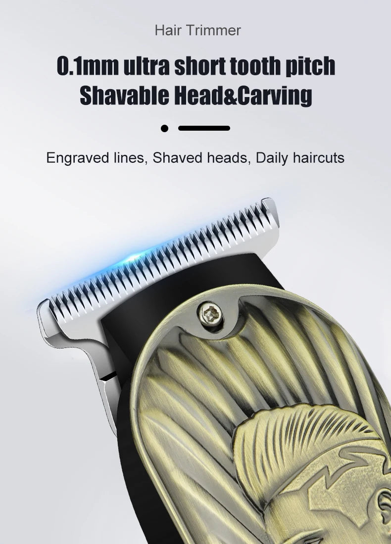 Close-up of a silver hair trimmer head with engraved lines and a gold-colored shaving blade.