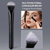A black multifunctional concealer brush with a triangular shape shown next to a model applying makeup.