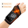 A hand wearing a black and orange heating and massage wrist brace with glowing vibration points.