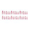 A row of pink cat eye false nails featuring 3D floral and butterfly designs.