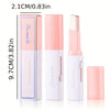 A set of three pink and white La Mer double color eyeshadow sticks shown next to a measurement ruler.