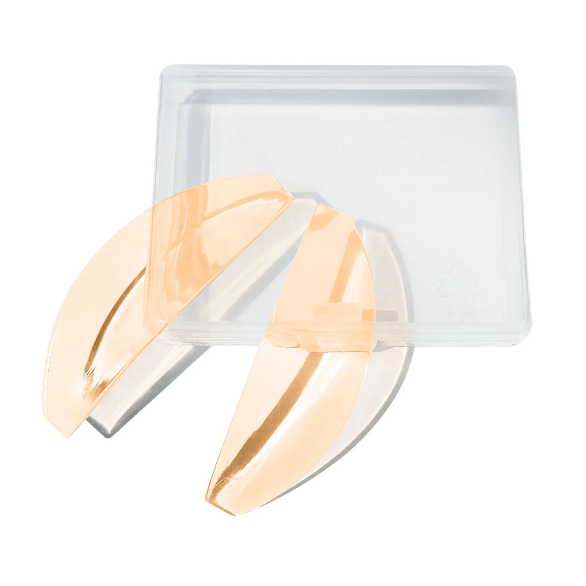 Clear silicone lash lift pads with gold-toned adhesive on a transparent plastic tray
