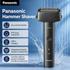 A black Panasonic Hammer Shaver is shown standing upright, surrounded by splashing water.