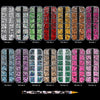 Una colección de kits de arte de uñas con diferentes colores y diseños de pedrería de flatback.