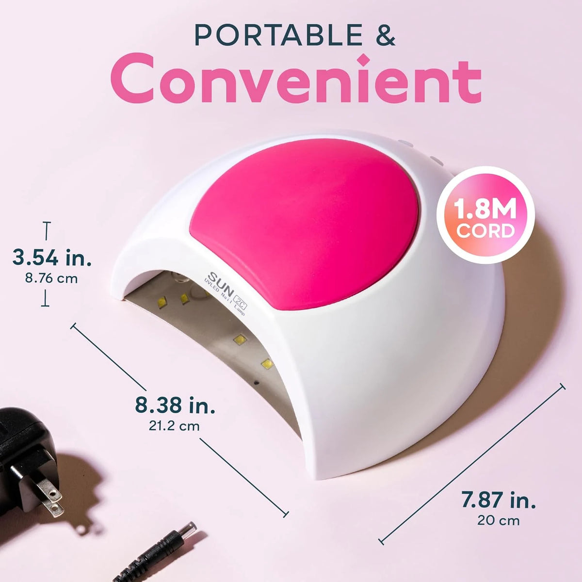 Lampe UV portable LED blanche pour ongles avec lumière rose, vue de côté.
