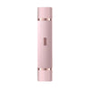 A pink portable dual-head electric shaver with a ribbed body and silver accents.