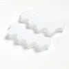 White silicone toe separators designed for foot and bunion relief.