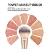 A set of seven pink makeup brushes with nylon fiber wool bristles displayed radiating from a central handle.