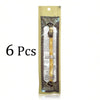 Six pieces of traditional wooden miswak toothbrushes packaged in a clear plastic pouch
