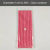 A package of pink soft foam heatless hair rollers with a circular marker on the center.