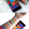 A collection of 20 vibrant, non-toxic body paint colors displayed in a palette and applied on a hand.