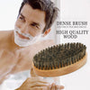 A close-up of a dense brush made of high quality wood bristles used for beard grooming.
