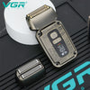 A professional electric hair trimmer set featuring a metallic silver body and a textured guard, shown in various angles.