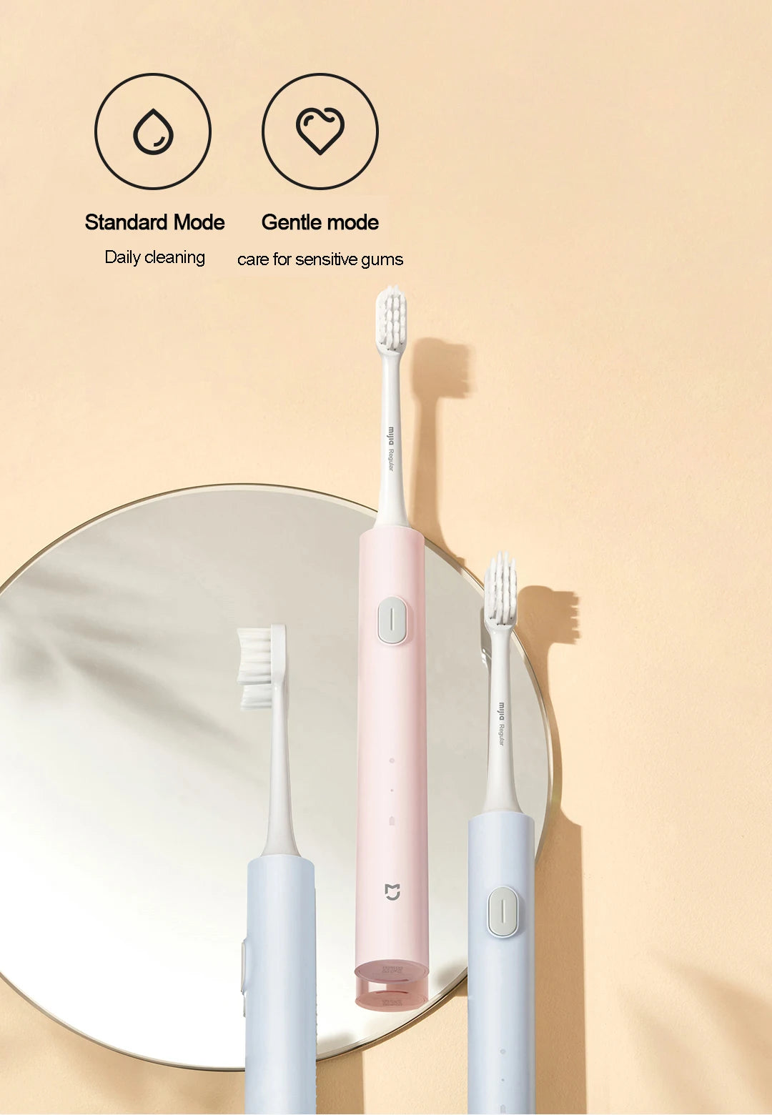 A pink and blue sonic electric toothbrush is shown next to its brush head, illustrating standard and gentle cleaning modes.