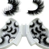 A pair of natural mink striped false eyelash extensions shown as loose lashes and in an open tray.