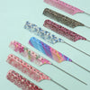 A collection of anti-static rat tail combs in various patterns including leopard print, floral designs, and solid colors.