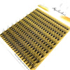 A close-up of a fan-shaped cluster of black mink eyelashes displayed on a white background.