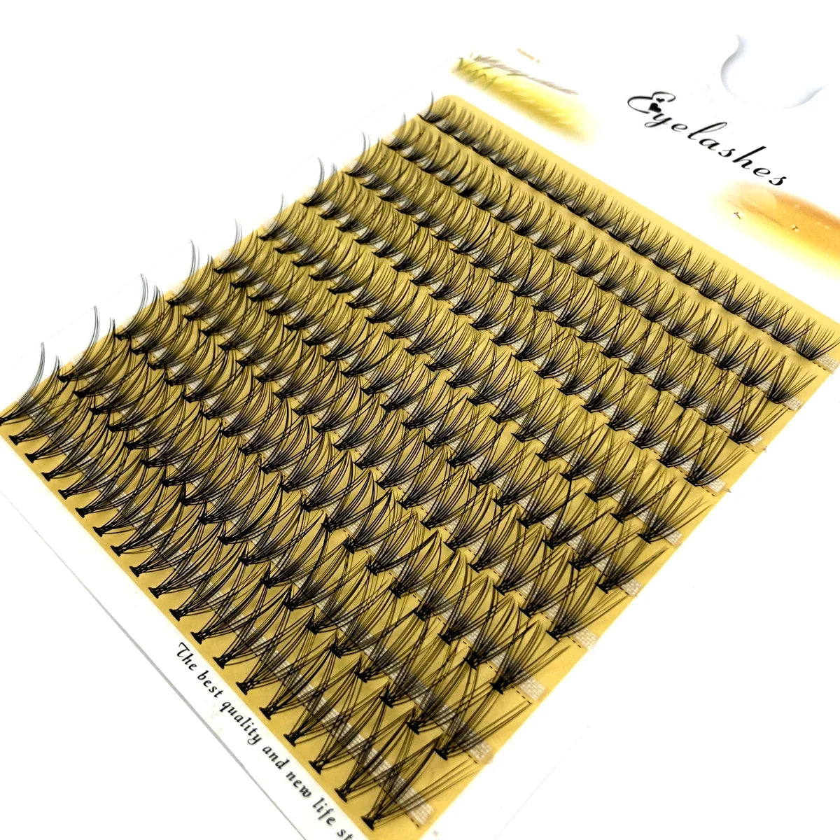 A close-up of a fan-shaped cluster of black mink eyelashes displayed on a white background.