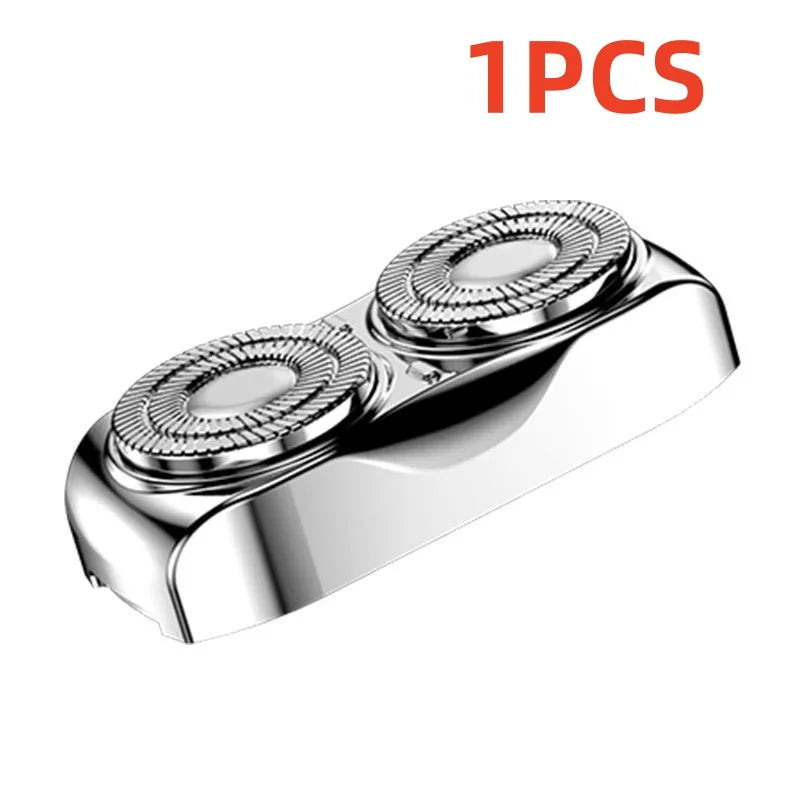 A single stainless steel dual blade electric shaver for men shown from above.