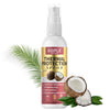 A bottle of Goiple Thermal Protection spray next to coconut halves and a palm frond.
