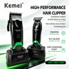Black Kemei high-performance hair clipper with green accents and charging port shown on a green surface.