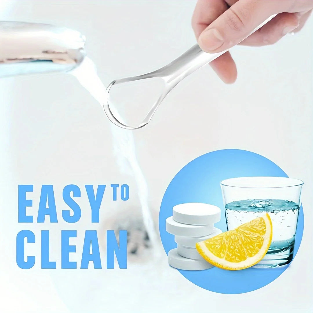 A hand uses a stainless steel tongue scraper to clean a glass, demonstrating how easy it is to clean.