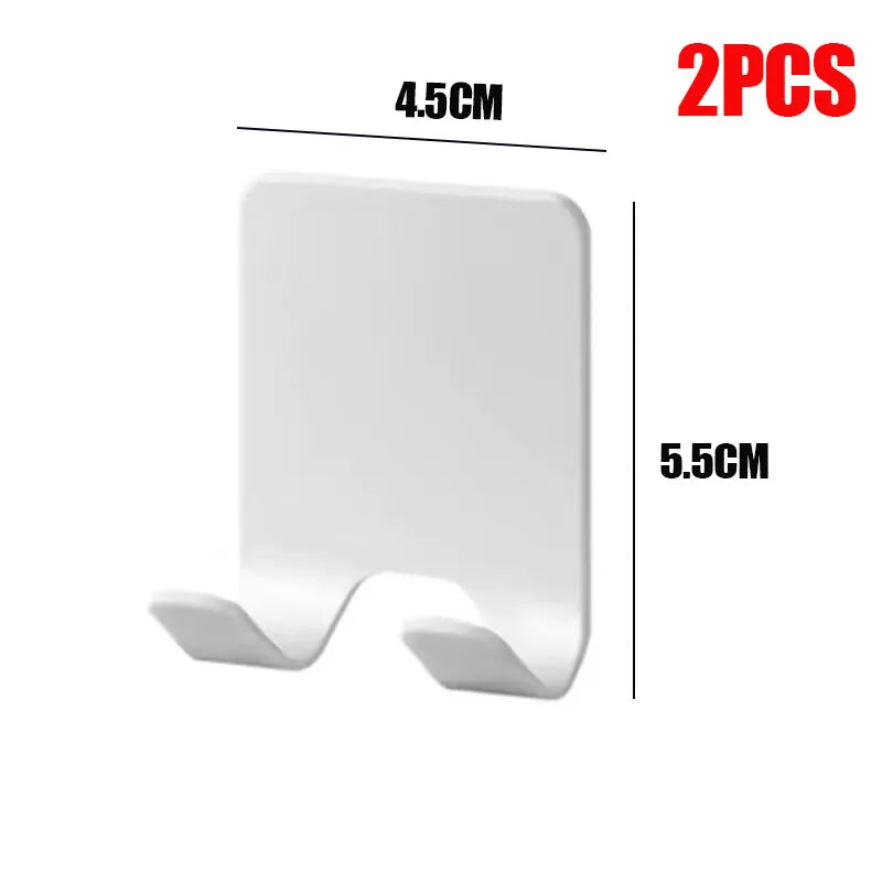 Deux porte-rasoirs multifonctions blancs, mesurant 4,5 cm par 5,5 cm chacun.