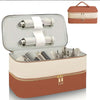 A brown PU leather storage bag with a lid, containing two silver hair dryers and several combs.