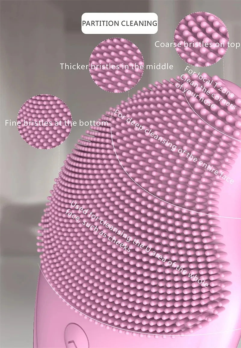 Close-up of a pink USB rechargeable facial cleansing brush showing various bristle types for deep cleaning.